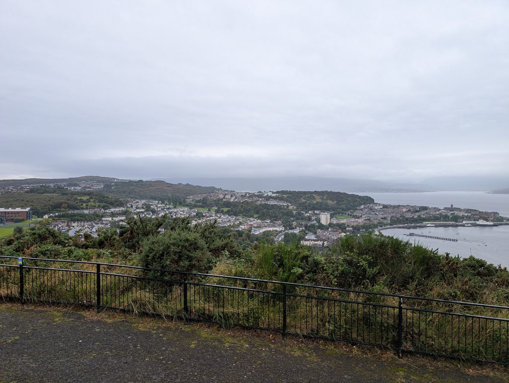Misty view over a hillside railing down onto Gourock and the Firth of Clyde
